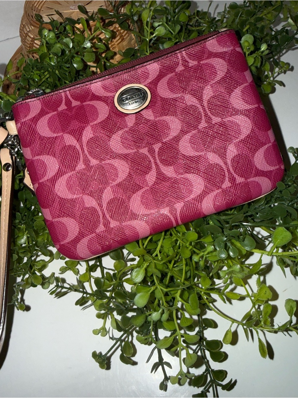 Coach Signature C pattern in berry pink